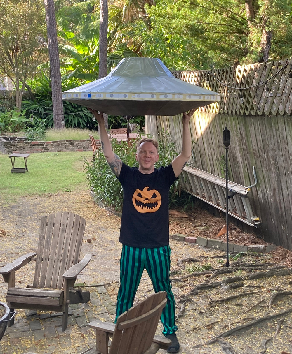 Me, outside, holding the UFO above my head