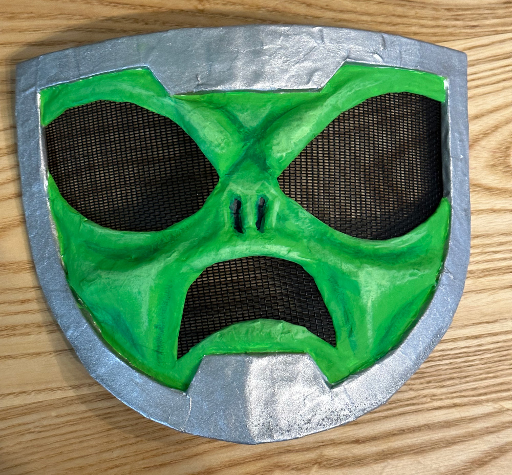 Painting highlights and shadows on the alien face, and installing screen in the eyes and mouth