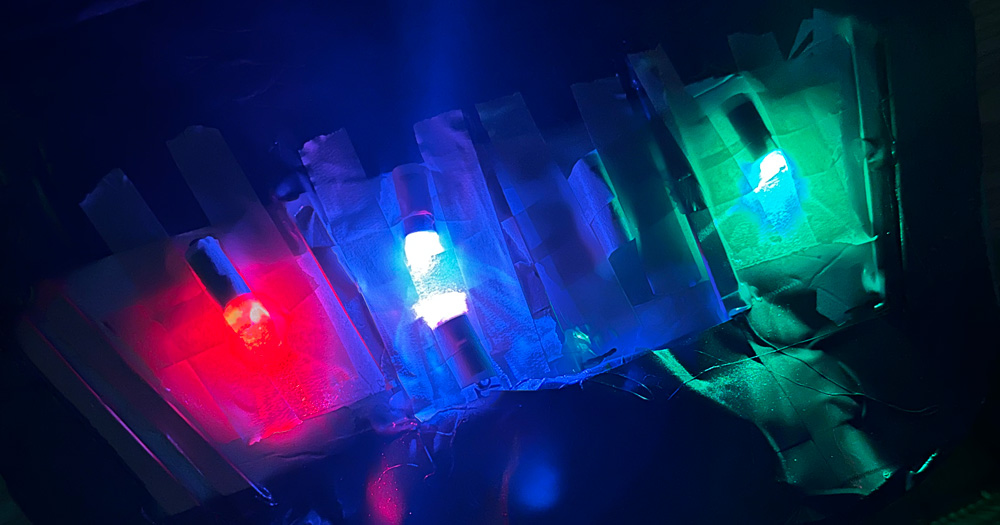 A close up of the lights behind the chest panel