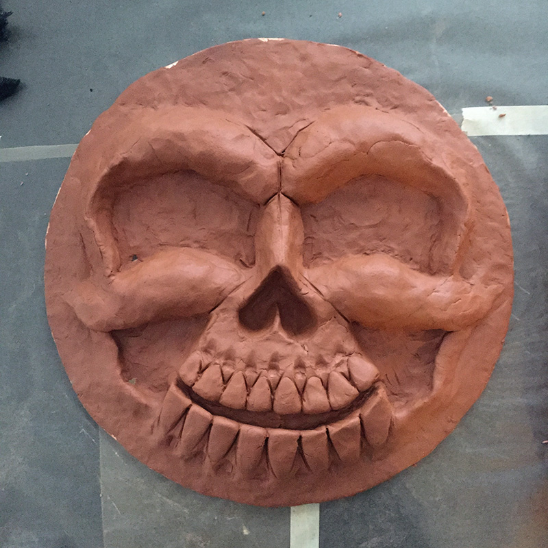 Cuckoo clock skull mask - sculpting the face with clay