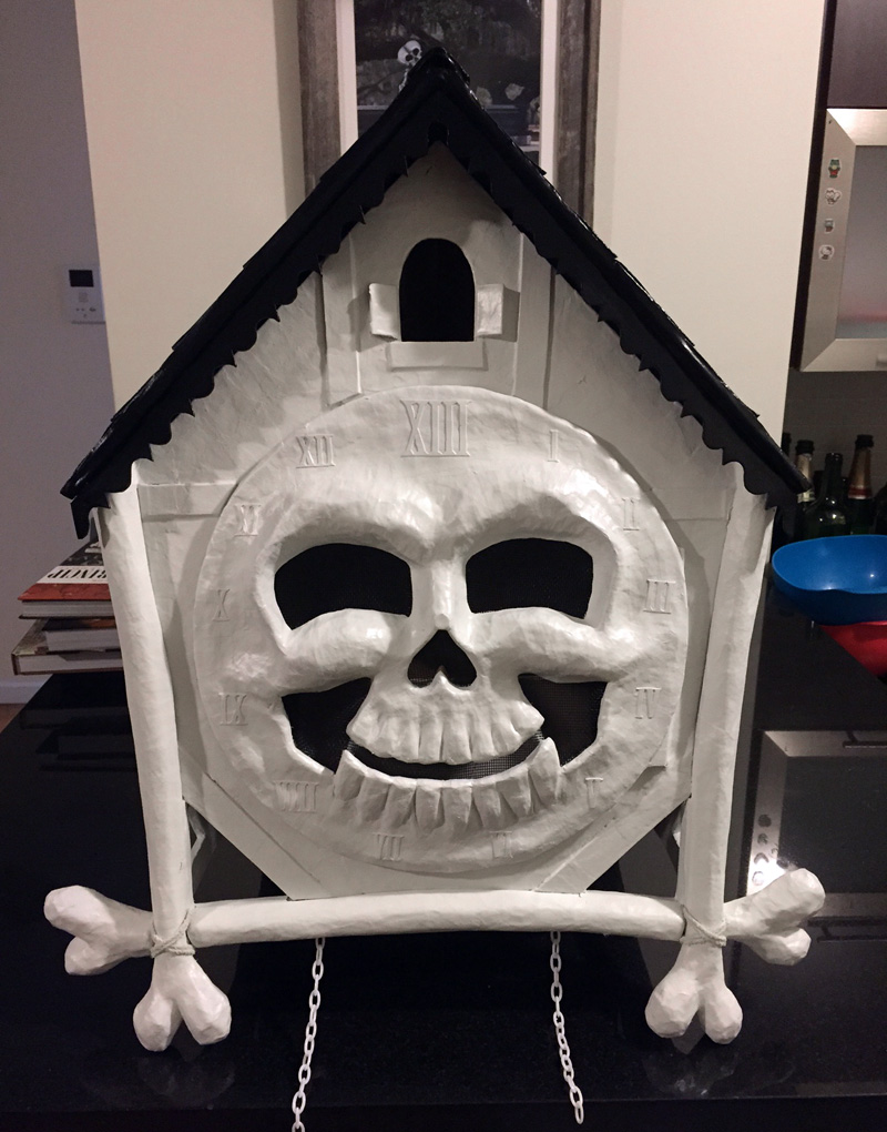 Cuckoo clock skull mask - roof and clock body spray painted!