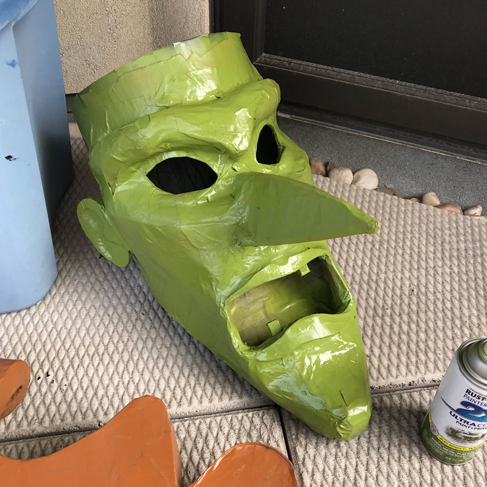 Giant witch statue - spray painting the head