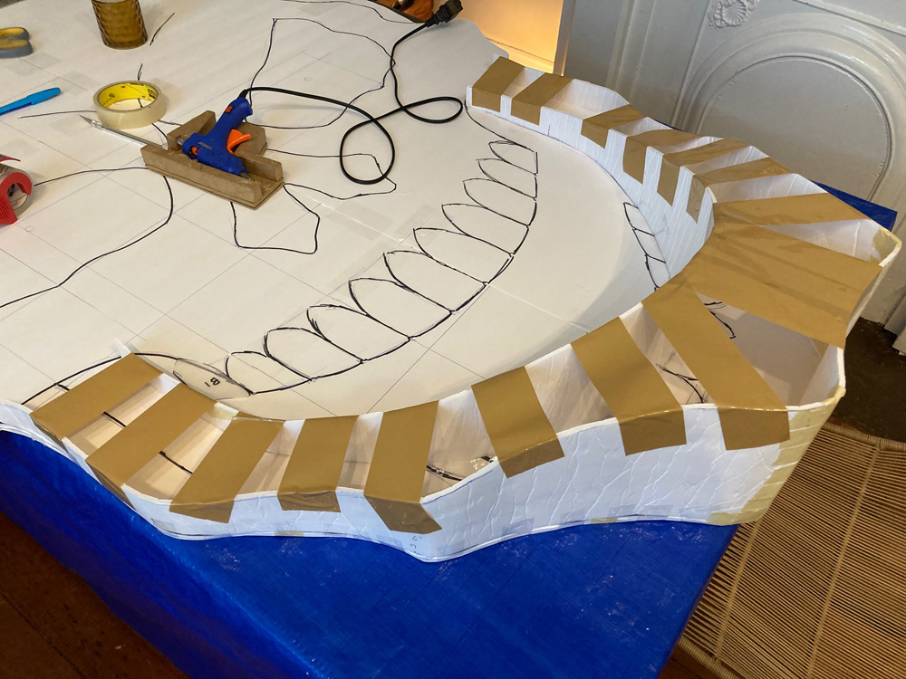 Giant paper mach&eacute; skull Halloween decoration - building up facial structures