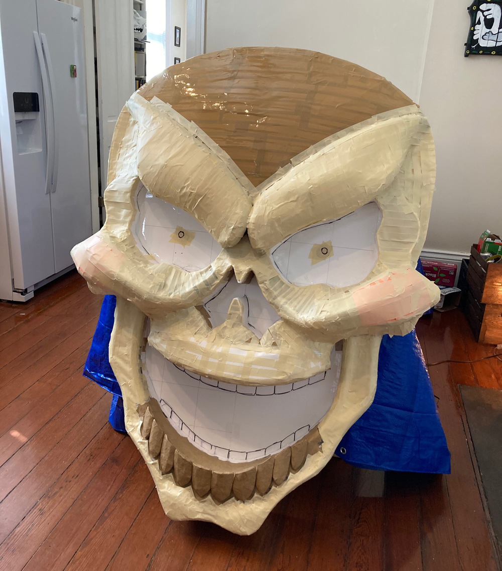 Giant paper mach&eacute; skull Halloween decoration - sculpture almost finished
