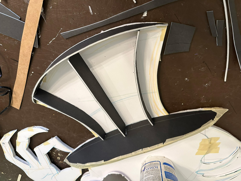 The Jabberwocky's hat in progress; it's a flat shape with some vertical ridges of foam board glued onto it.