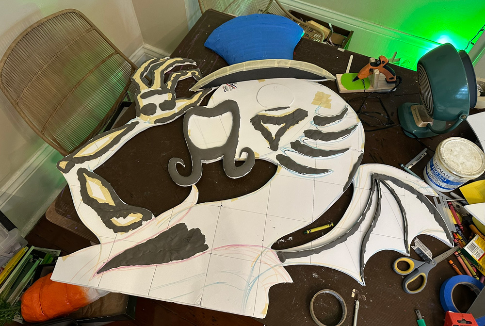 The first component of the Jabberwocky, made of flat foam board with lots of little ridges built up of gray foam clay, defining the raised areas.