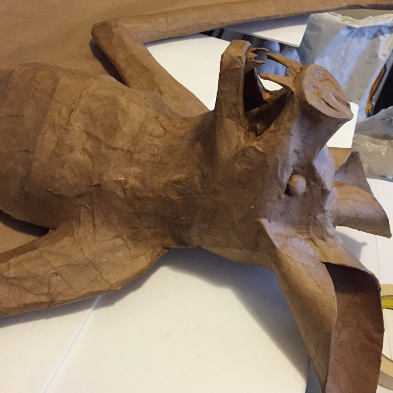 Papier mache bat -- adding paper mache to the neck