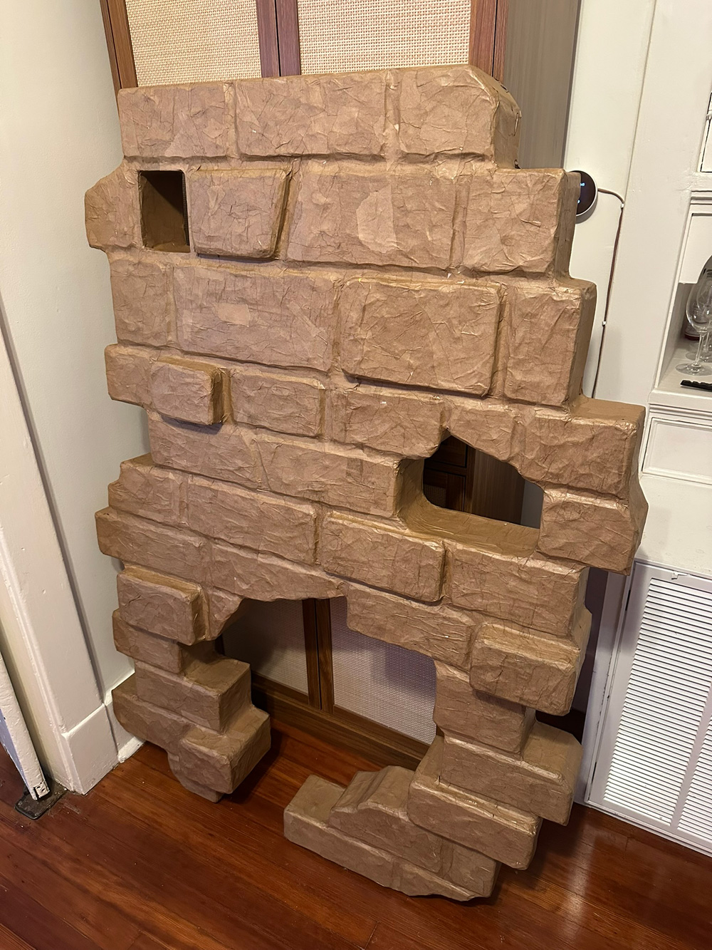 Covering the whole wall in brown paper mache