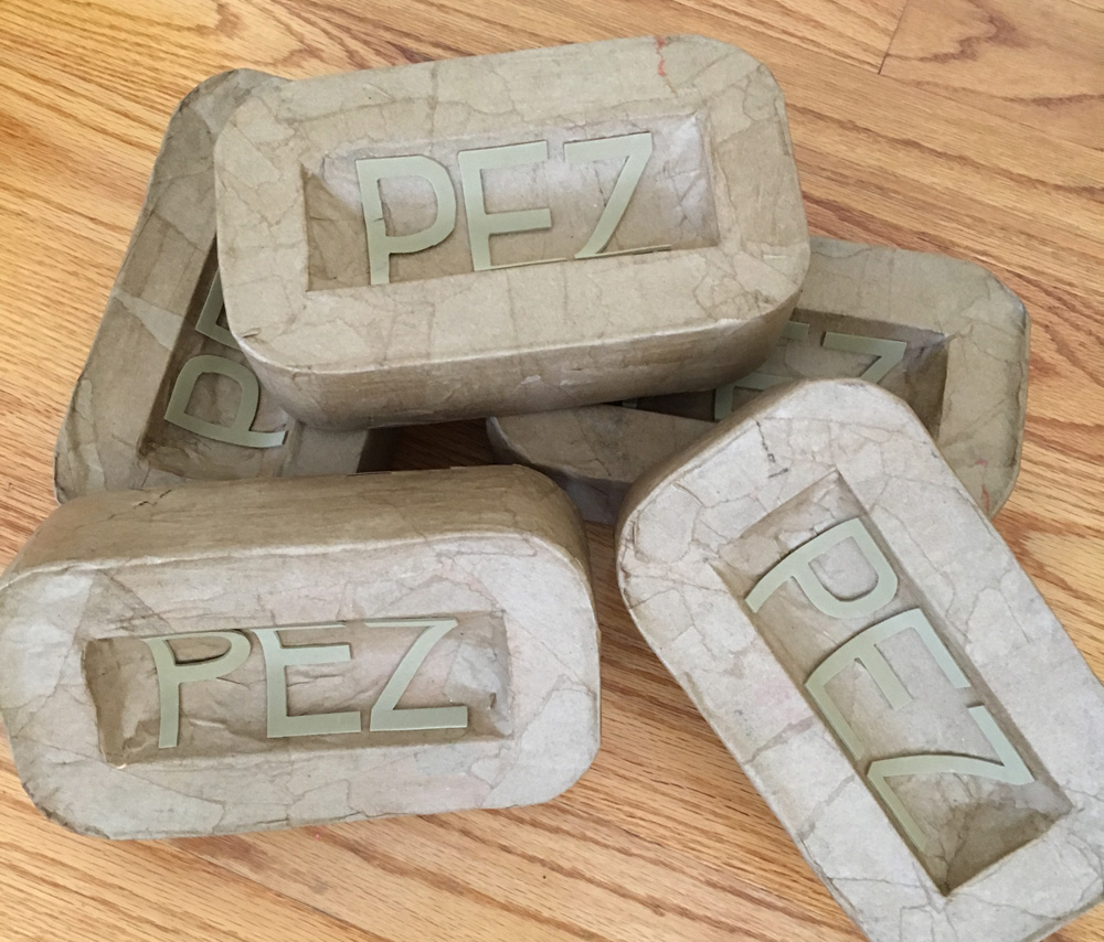 Making giant PEZ candies - letters in place