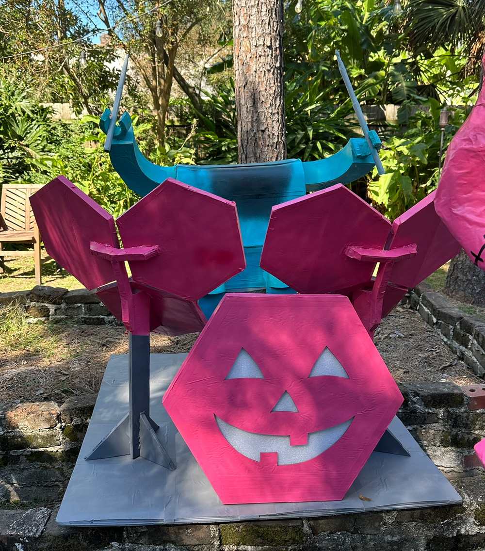 Front view of the alien set up in my back yard at his drums, but his head is missing