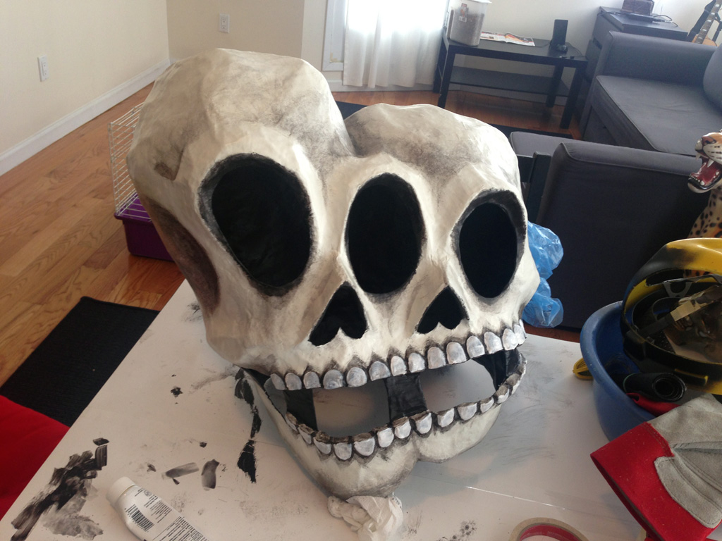 Painting completed on my Siamese twins paper mache skull mask