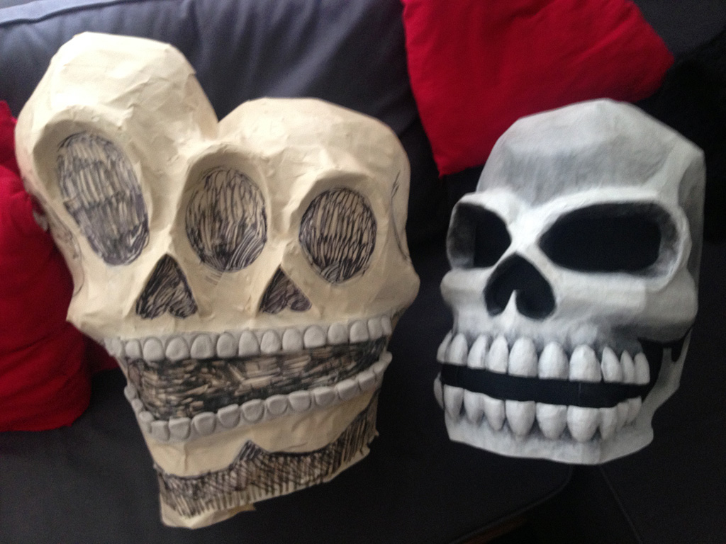 My conjoined twins skull in progress, with last year's skull mask for comparison