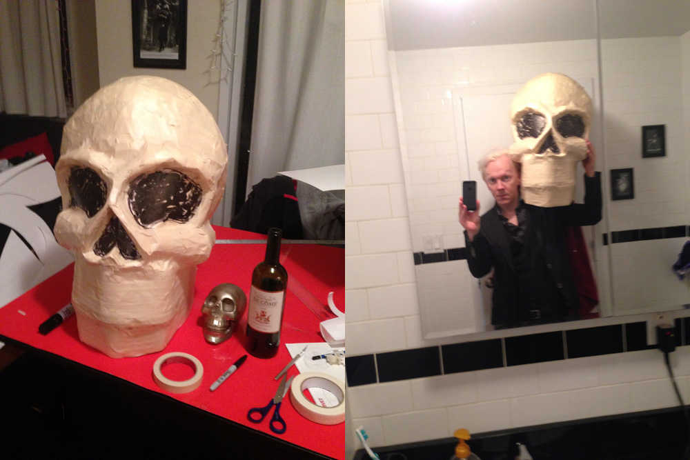 Giant paper mache skull sculpture, now part of a Halloween decoration