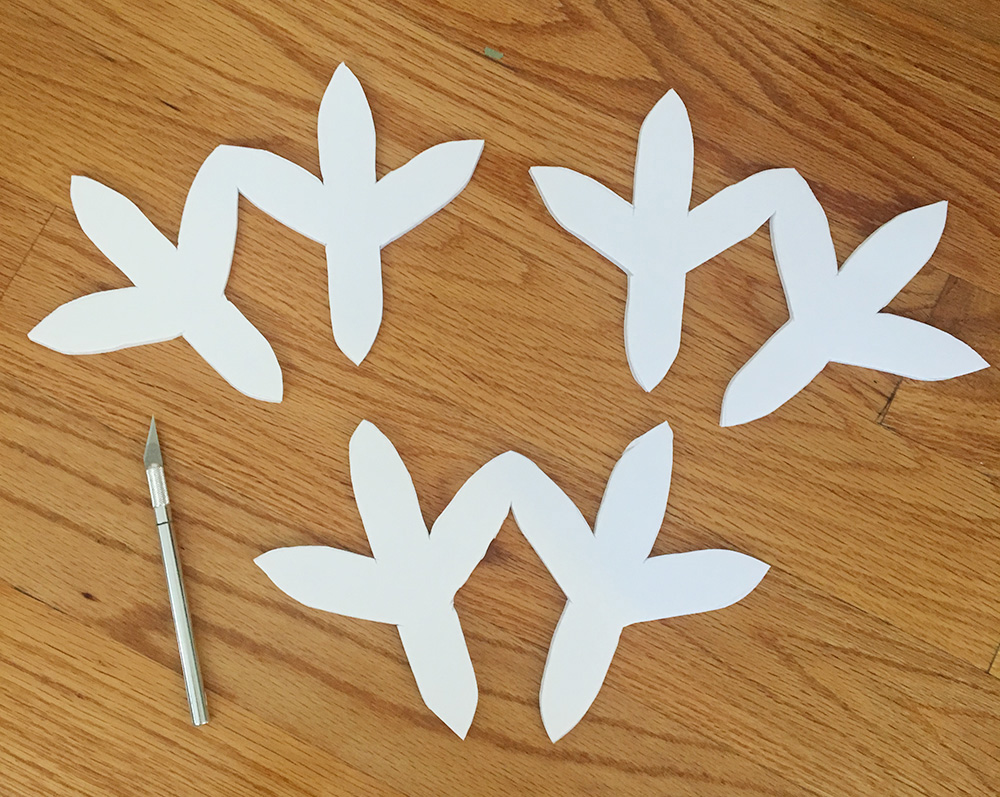 Papier mache baby chicks - cutting out the feet shapes