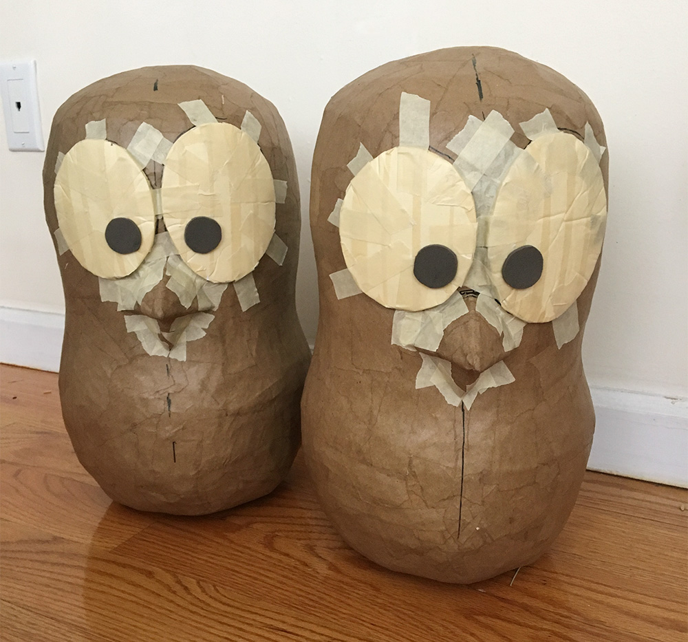 taping the eyes and beaks in place
