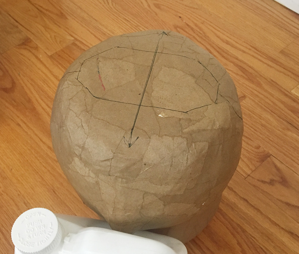 Papier mache baby chicks - marking the incision