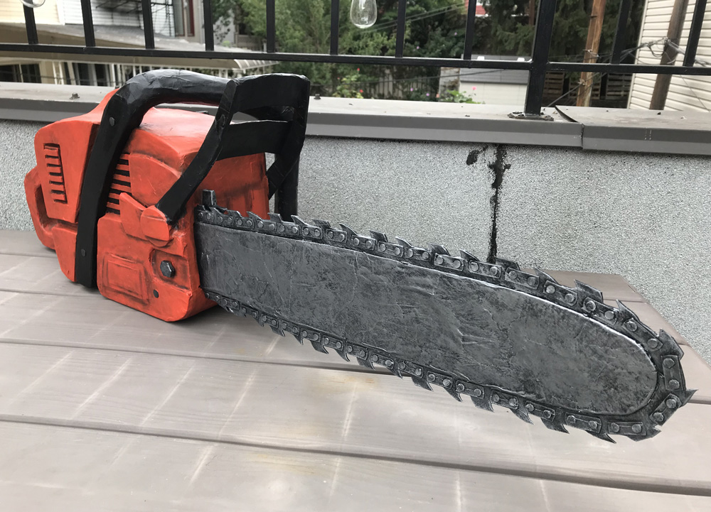 Paper mache chainsaw prop - painting done!
