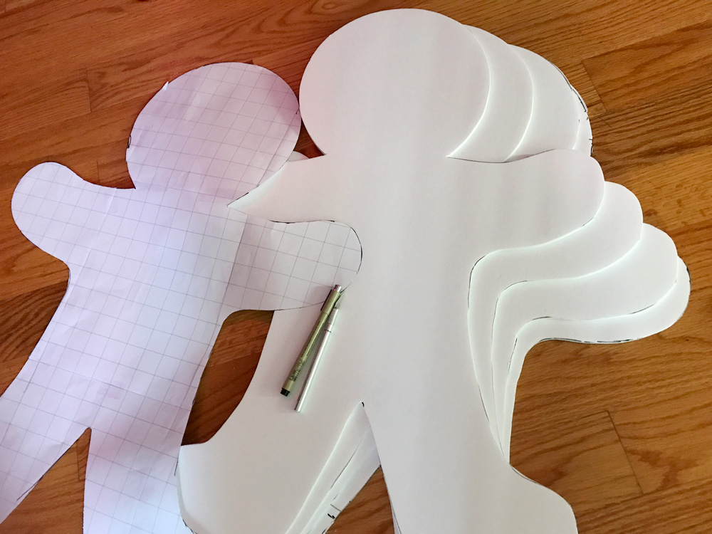 Paper mach&eacute; gingerbread men - cutting out foam board
