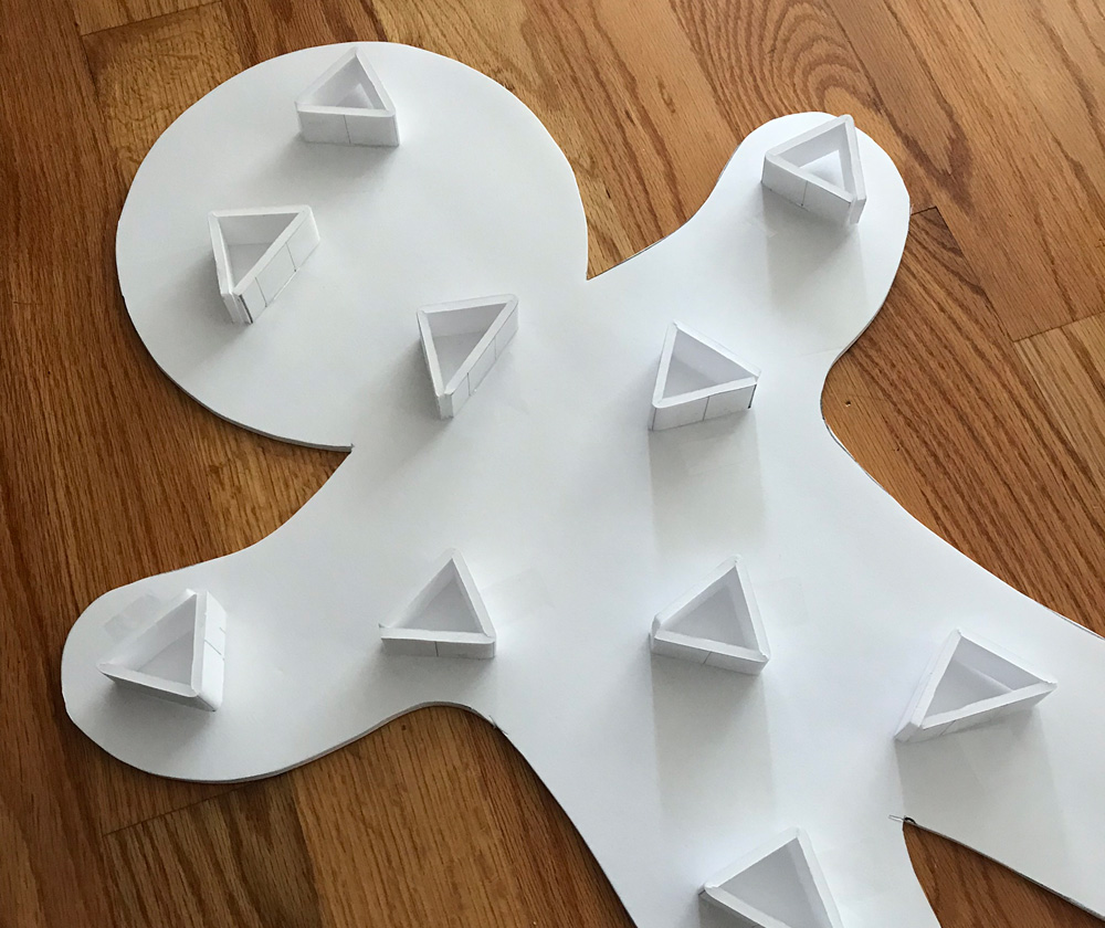 Paper mach&eacute; gingerbread men - foam board supports