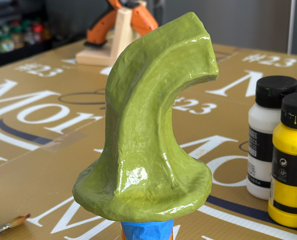 The stem is spray painted green.