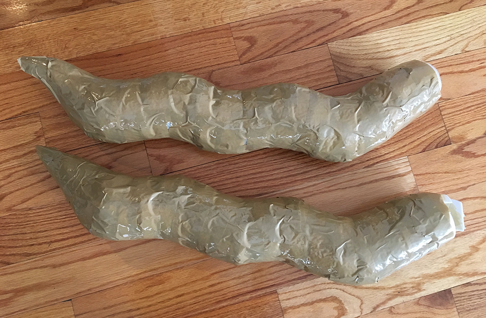 Papier mach&eacute; dragon sculpture - packing tape to smooth out the body
