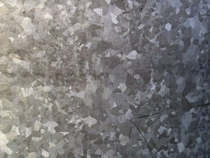 Mottled gray aluminum surface